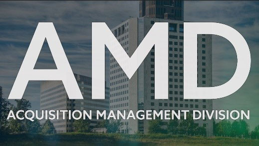 image display building in the background in white letters big font "AMD" and sub text smaller font "Acquisitions Management Division"