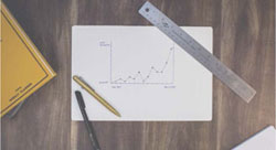 image of 10 CFR 50 Owners Activity Reports with piece of paper on a table