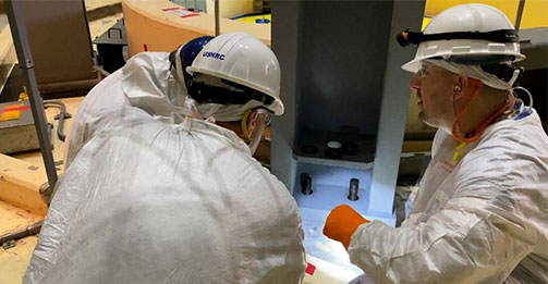 NRC’s Chris Safouri (right) and Brad Bishop are #OntheJob at the Vogtle nuclear power plant during a refueling outage for an inspection on the licensee’s reactor head stand modification.