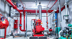 Photo of onsite automatic fire protection apparatus consisting of a pump and various piping