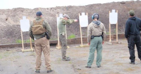 image of 10 CFR 73 with security personnel training on range