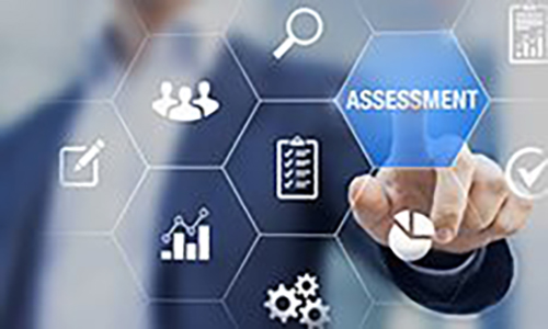 This image contains a person on the background touching the word assessment that appears on a grid of icons up front