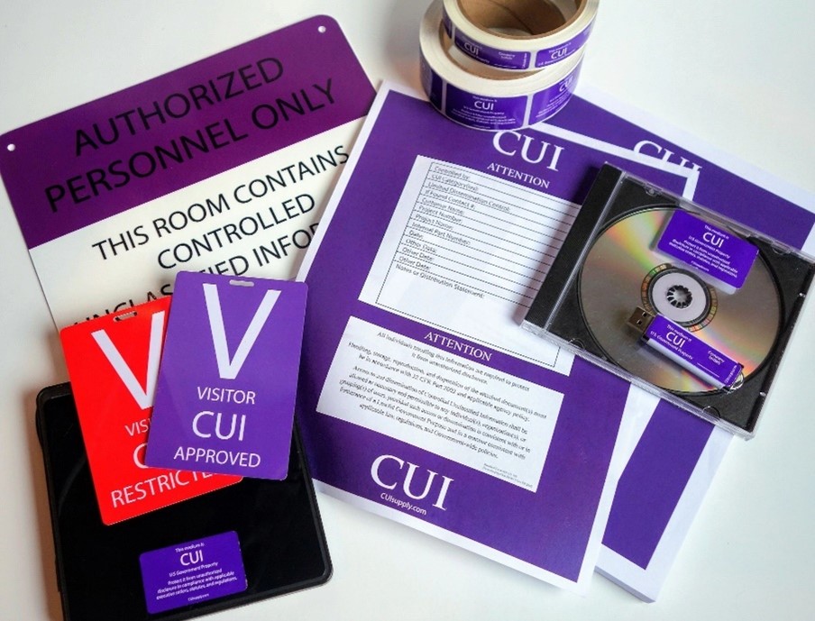 an image of a CD, documents, and other media with the label 'CUI'.