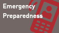 navigational icon consisting of the words Emergency Preparedness in white text on a grey colored background and an outline in red color of a celluar type phone with buttons and a small viewing screen with an outline of a human torso; hyperlink to NRC Flickr Emergency Preparedness photo album