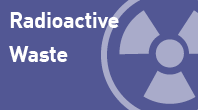 navigational icon consisting of the words Radioctive Waste in white text on a medium-purple colored background and a 3/4 circle with a solid image shapes of the Radiation Warning Symbol (Trefoil); hyperlink to NRC Flickr Radioactive Waste photo album