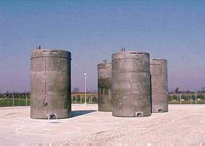 Photo of dry cask storage made of stainless steel canisters surrounded by concrete