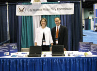 Angela Randall and Andrew Mauer of the NRC at the AAPM Vendor Fair.