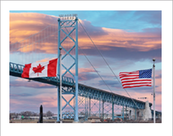US and Canadian flags