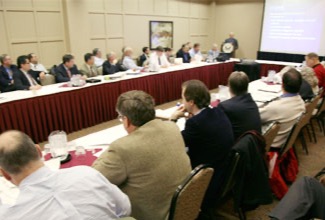 A group of people attending a presentation.