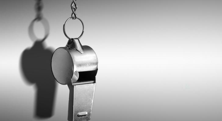 Hanging metal whistle in black and white