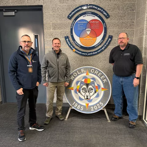 The Wolf Creek nuclear plant’s resident inspectors Cody Sigel (center) and Chris Hendersen (right) are joined by David Prescott, left, from Wolf Creek’s sister plant in the U.K., for an information exchange visit during the plant’s refueling outage.